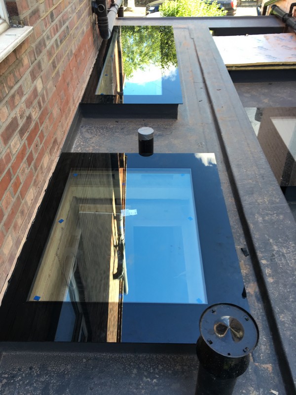 Multiple flat roof skylights on extension in Crouch End